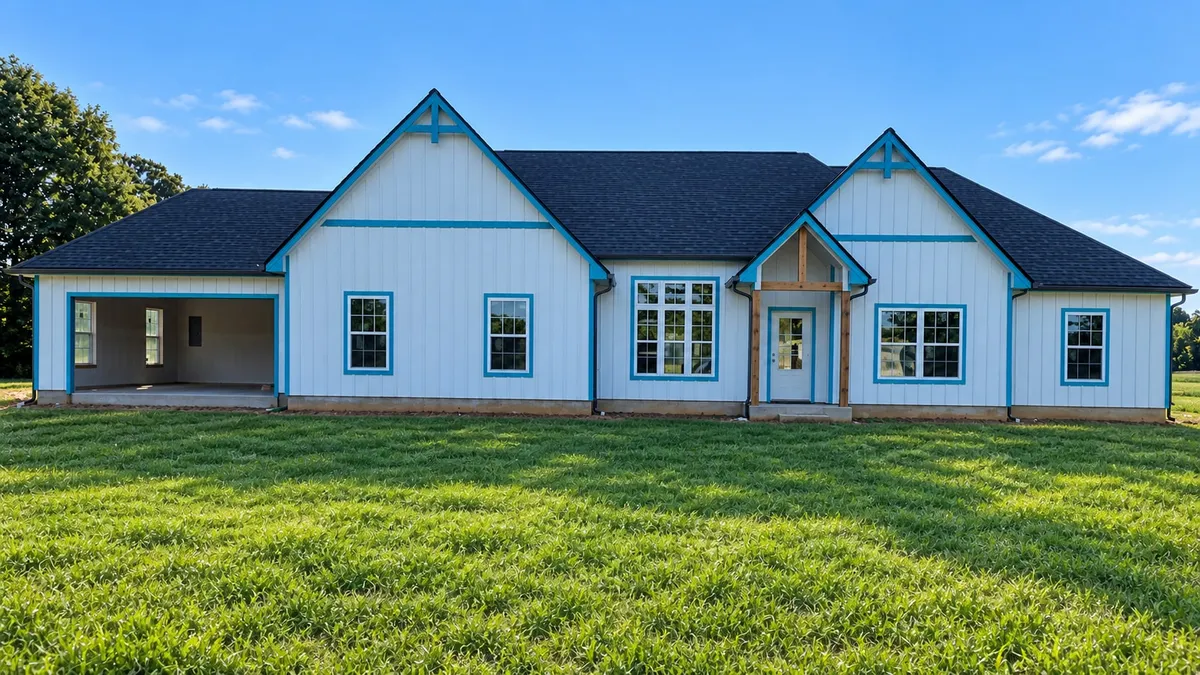 White board-and-batten new-build home with blue trim, multiple gables, an open garage, dark gutters and downspouts, and a green lawn